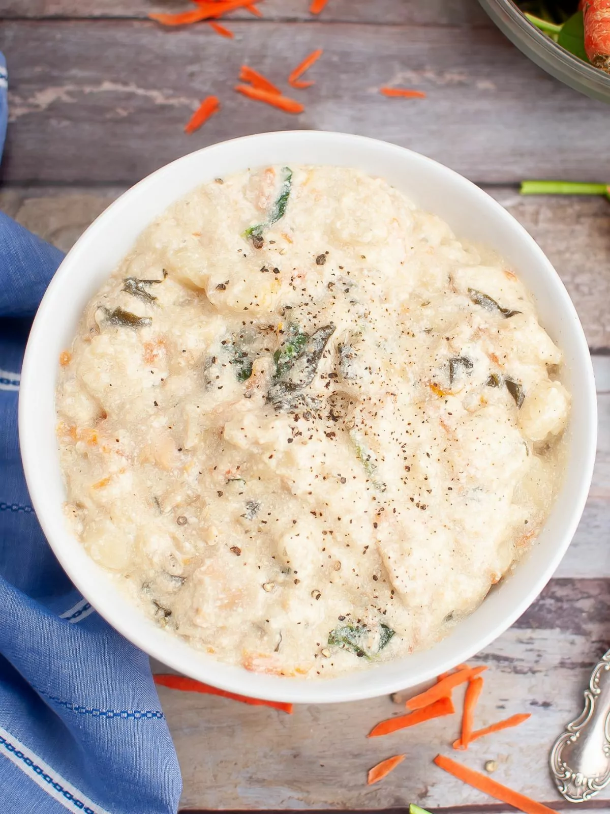 overhead view of Chicken Gnocchi Soup served in a white bowl