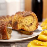 slice of cinnamon streusel coffee cake on a serving knife