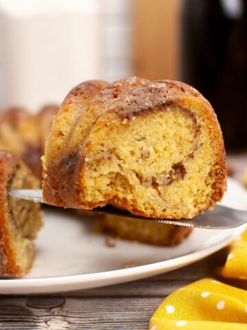 slice of cinnamon streusel coffee cake on a serving knife