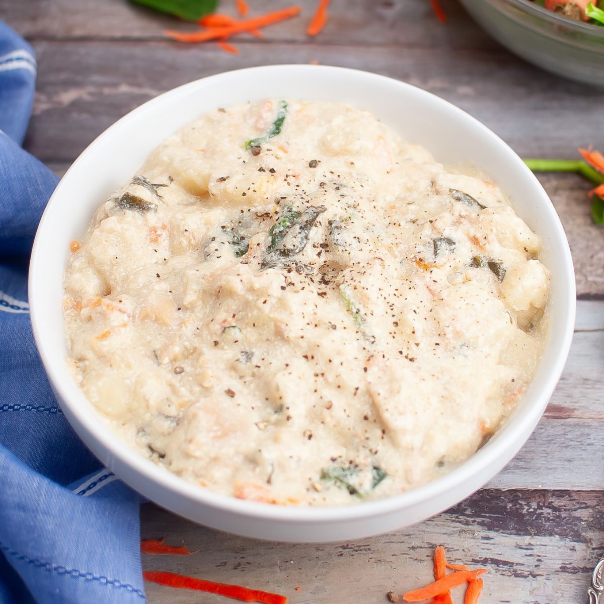 white bowl filled with chicken gnocchi soup