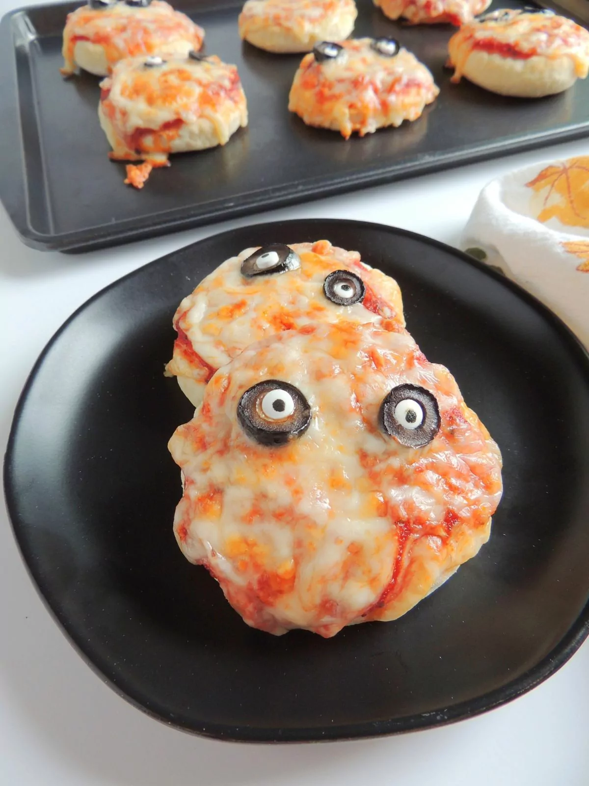 closeup of mummy pizzas.