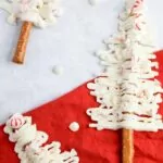 3 white chocolate Christmas tree pretzel rods