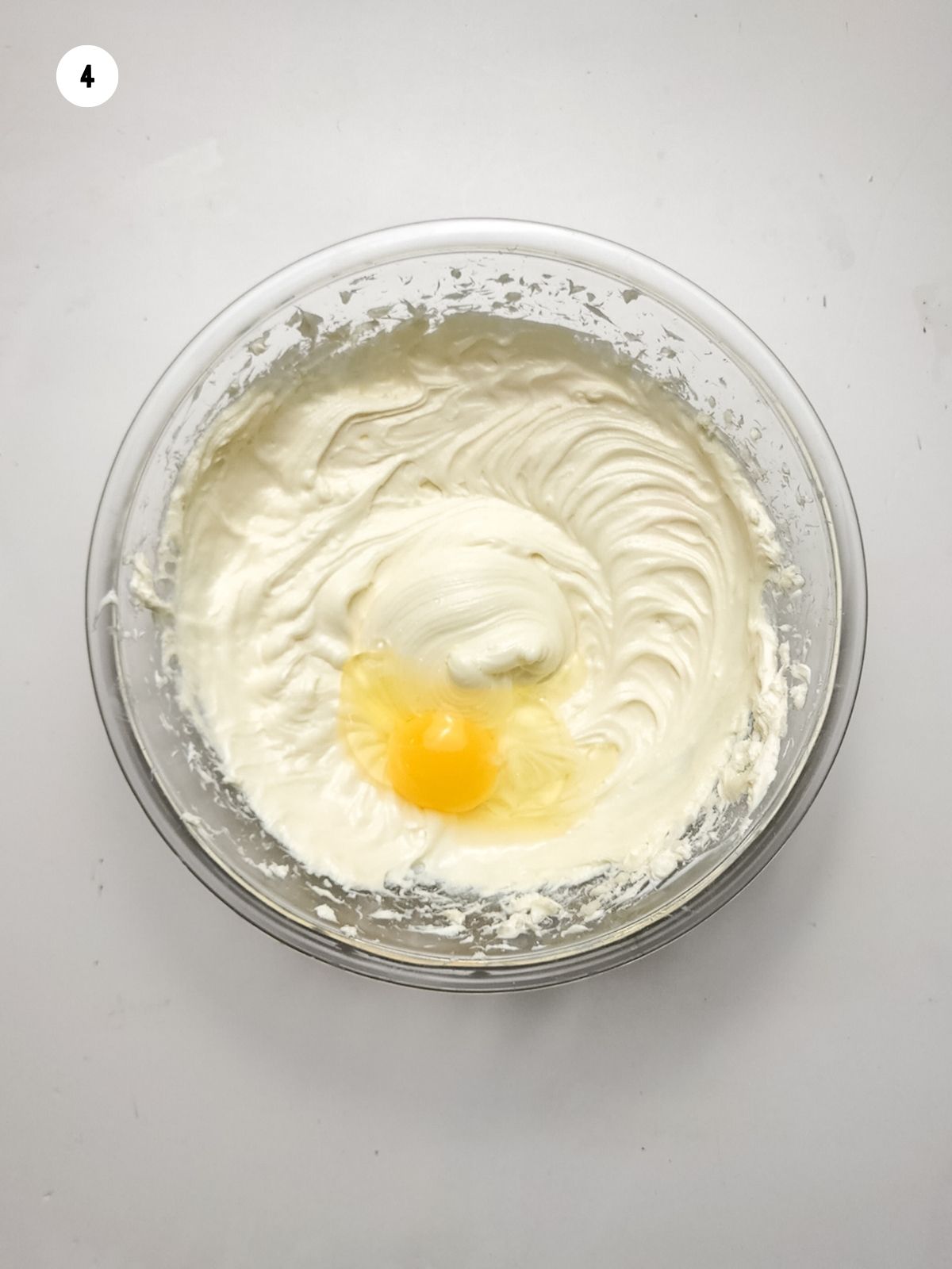 cream cheese mixture with egg in bowl.