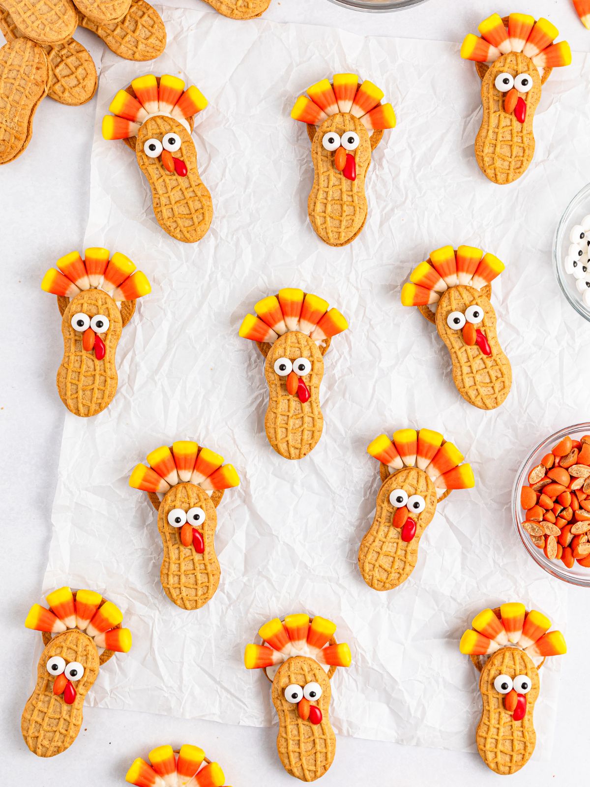 completed nutter butter turkeys on parchment paper