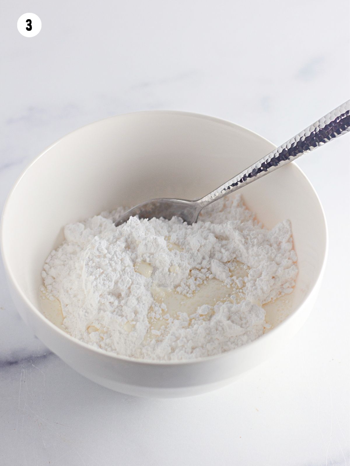 mix powdered sugar with milk and vanilla in small bowl.