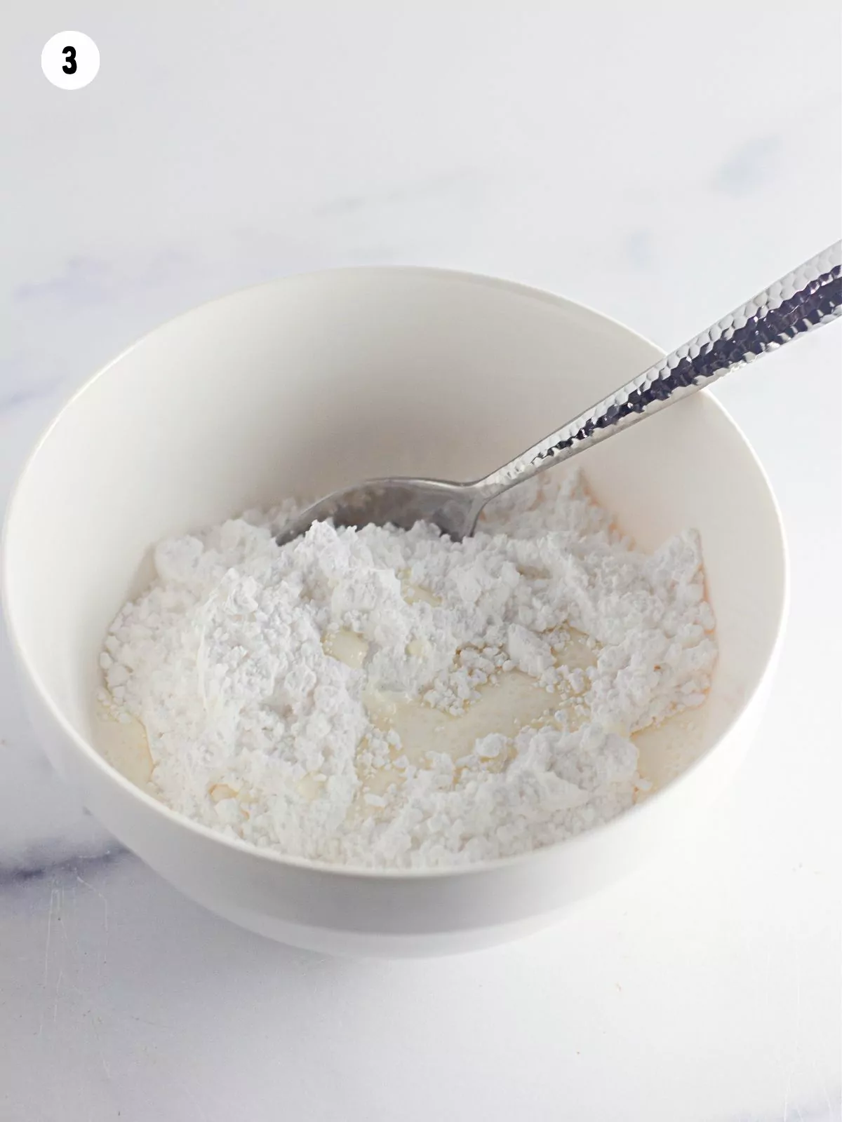 mix powdered sugar with milk and vanilla in small bowl.