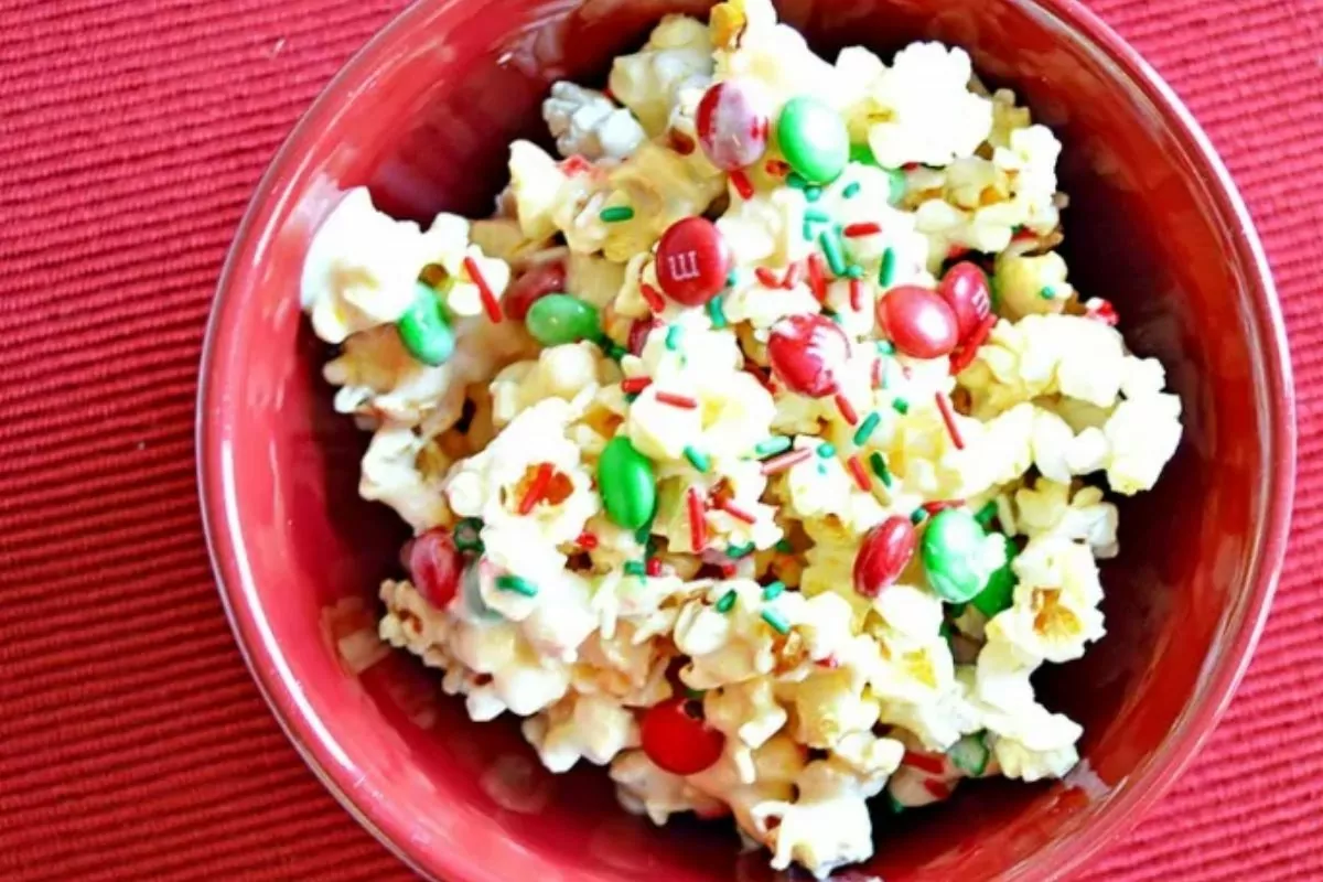 popcorn with candy in red bowl.