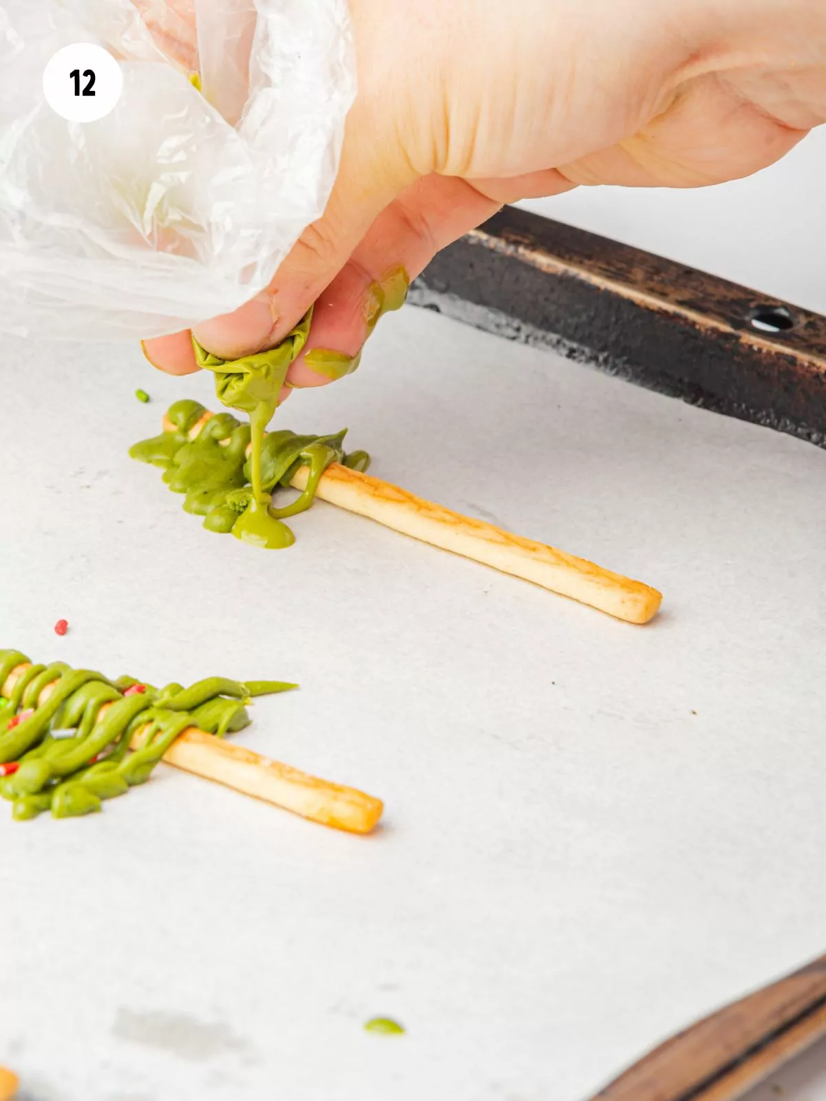 green chocolate piped on stick for trees