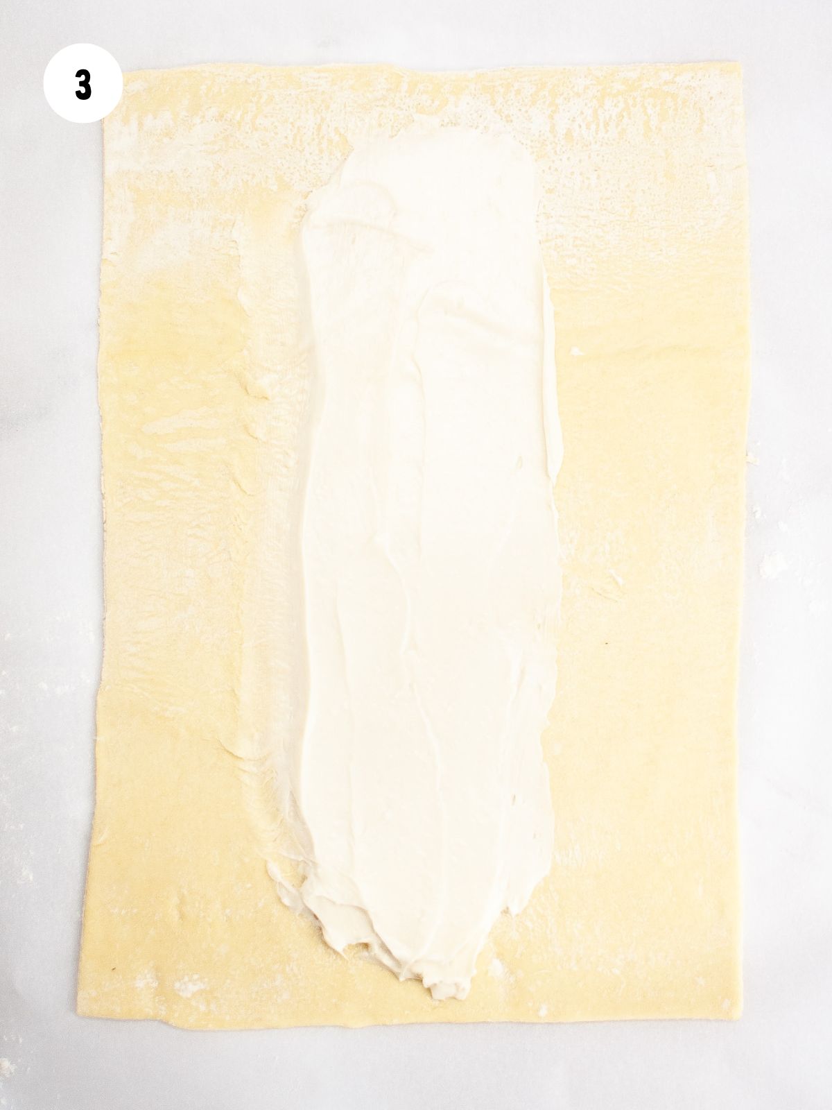 Cream Cheese Mixture added to the center of the sheet of puff pastry