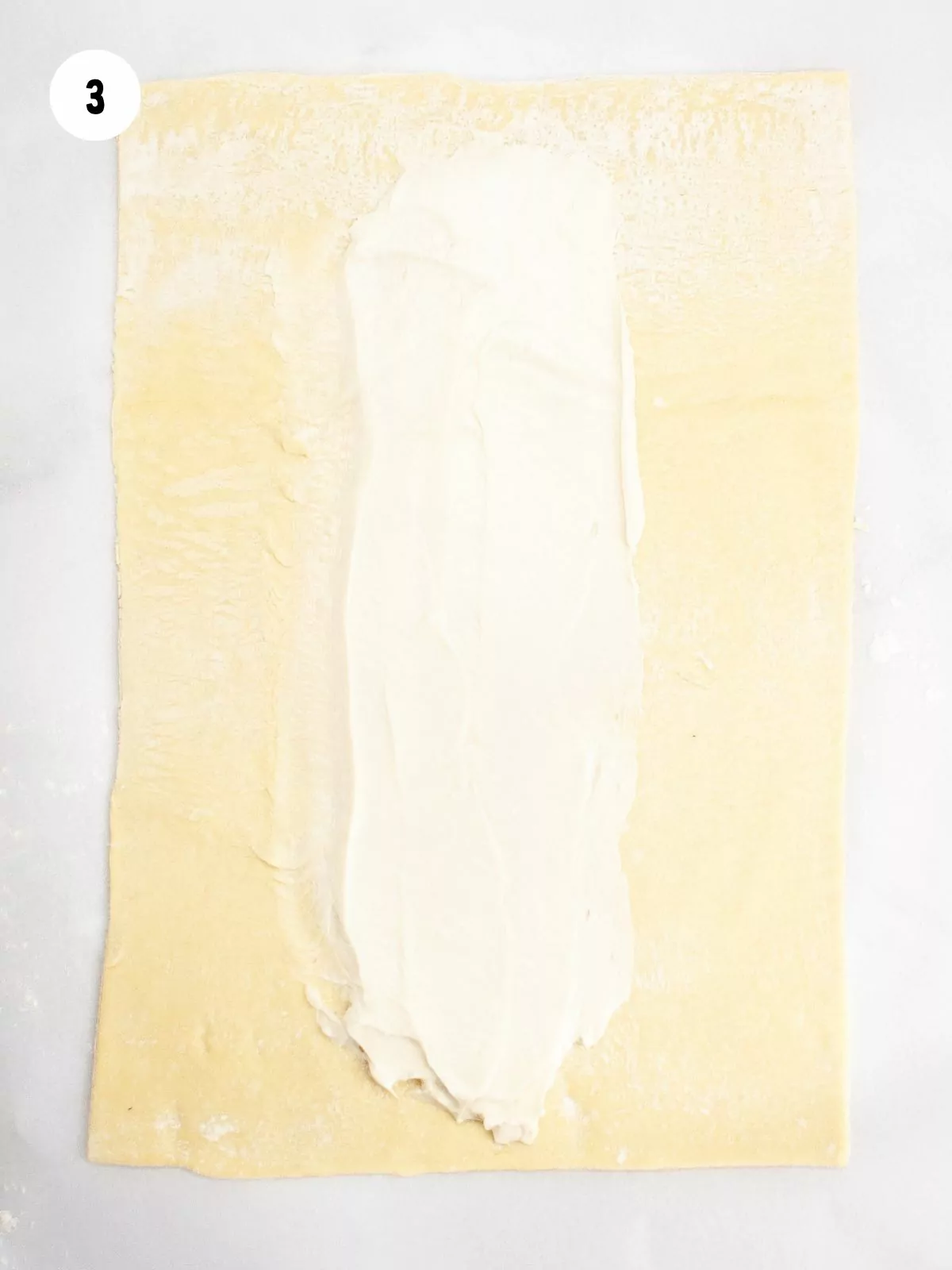 Cream Cheese Mixture added to the center of the sheet of puff pastry