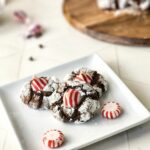 Hershey peppermint kisses in chocolate crinkle cookies.