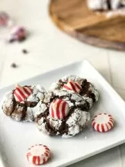 Hershey peppermint kisses in chocolate crinkle cookies.