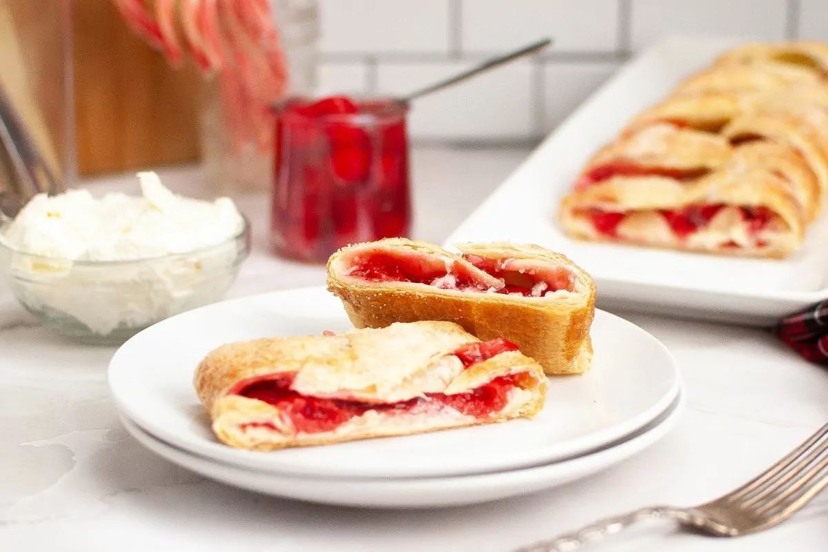 Christmas Breakfast Danish sliced and served on a white plate