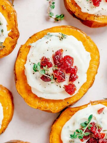 sweet potato slices roasted with goat cheese and cranberries.