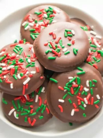 top view of chocolate mint no bake cookies with Christmas sprinkles