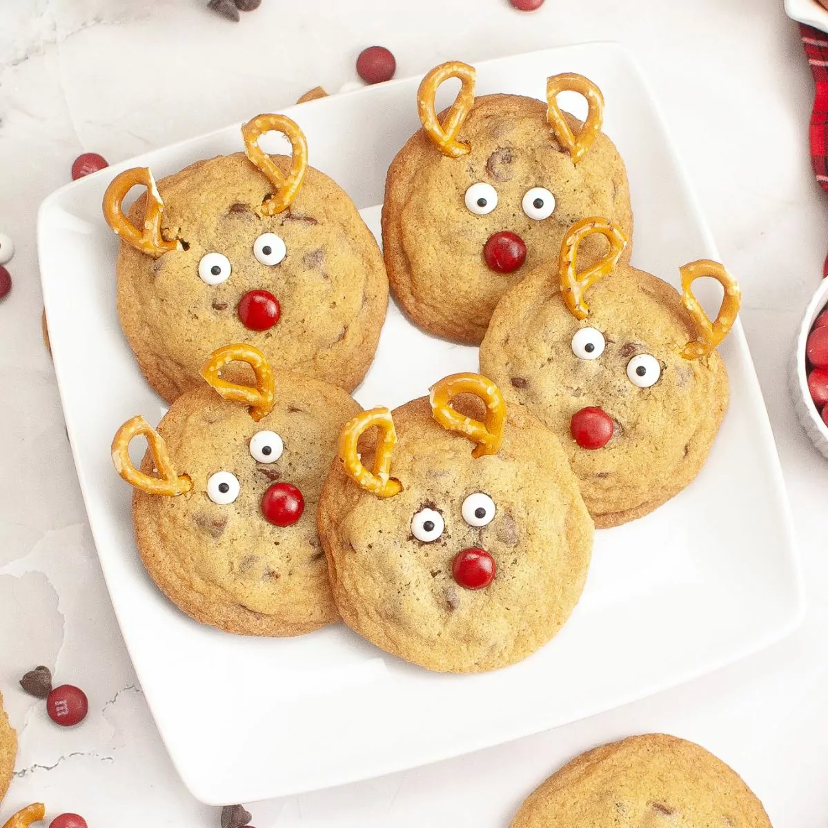 square white plate with reindeer chocolate chip cookies