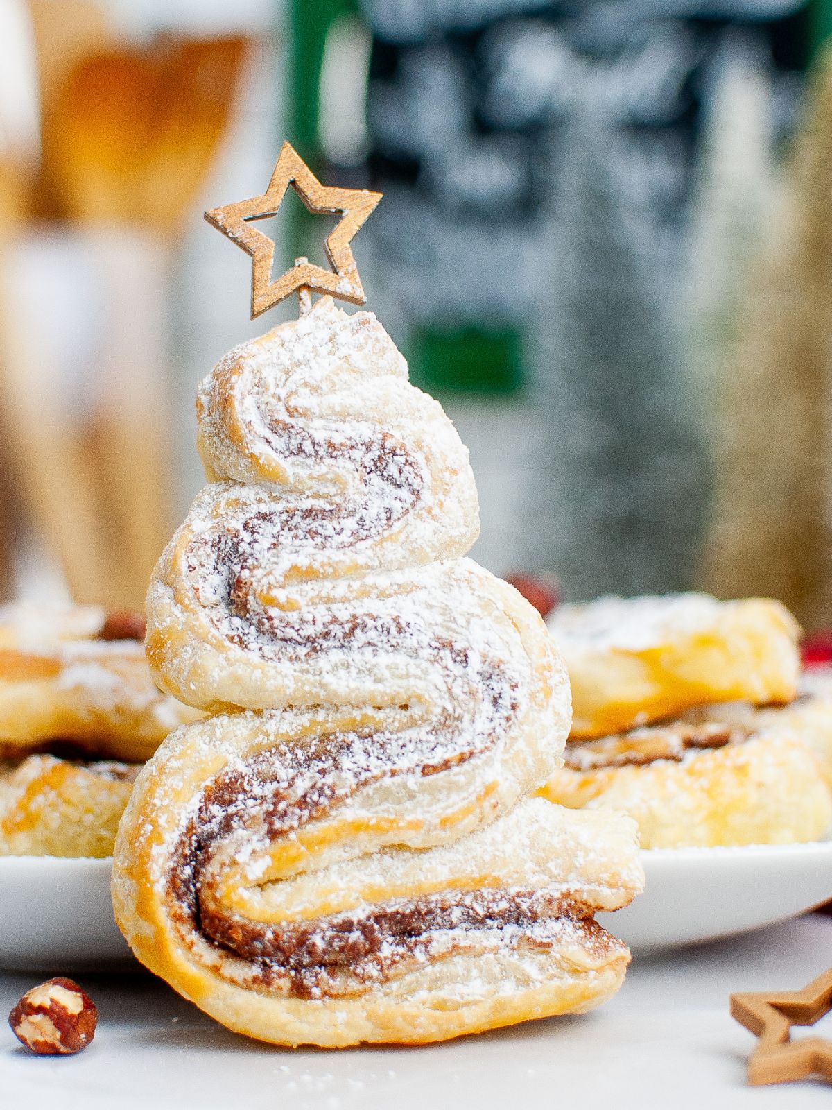 Nutella puff pastry in the shape of a tree on a star stick