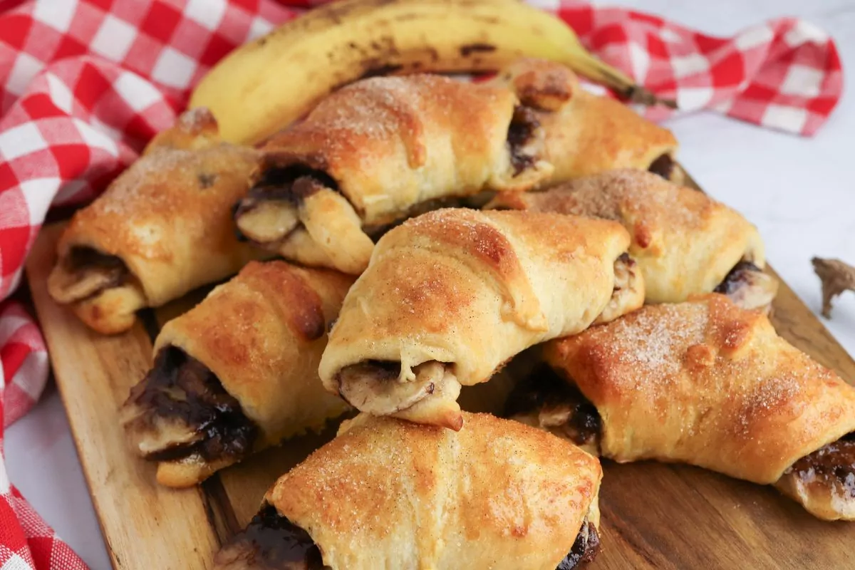 Nutella Banana Crescent Rolls on a wooden board