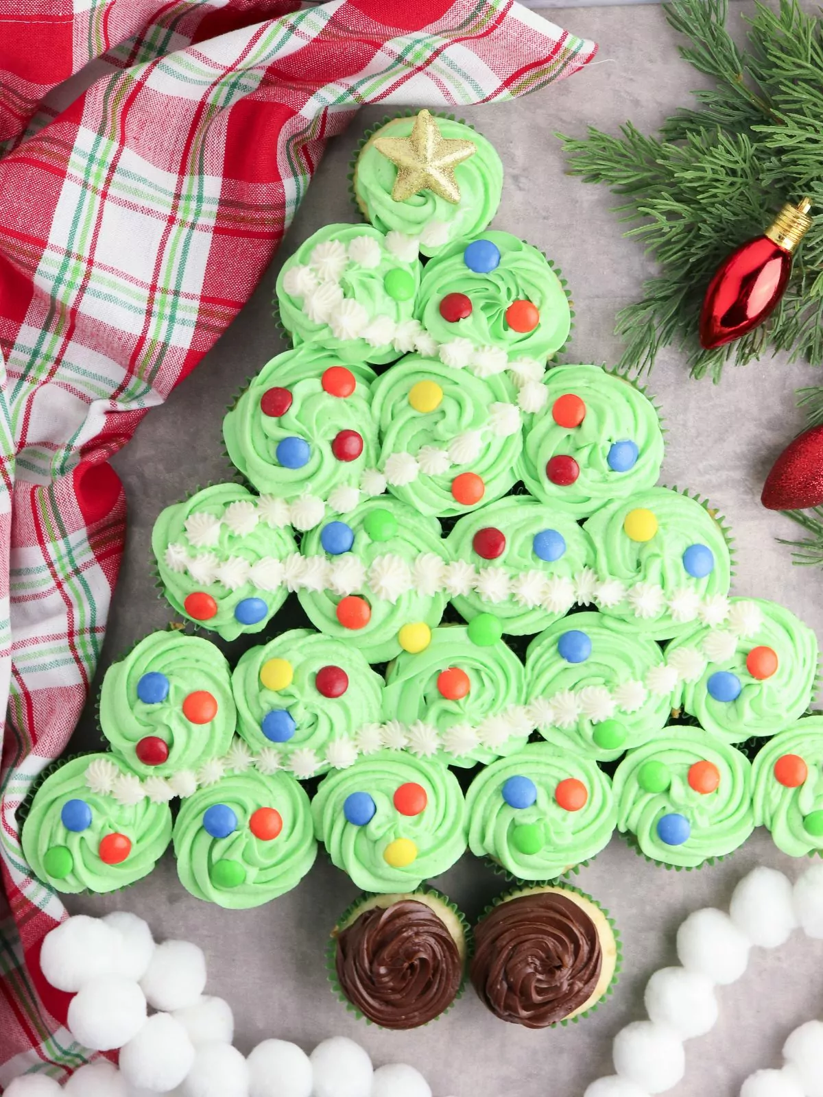 cupcakes arranged in the shape of a Christmas tree.