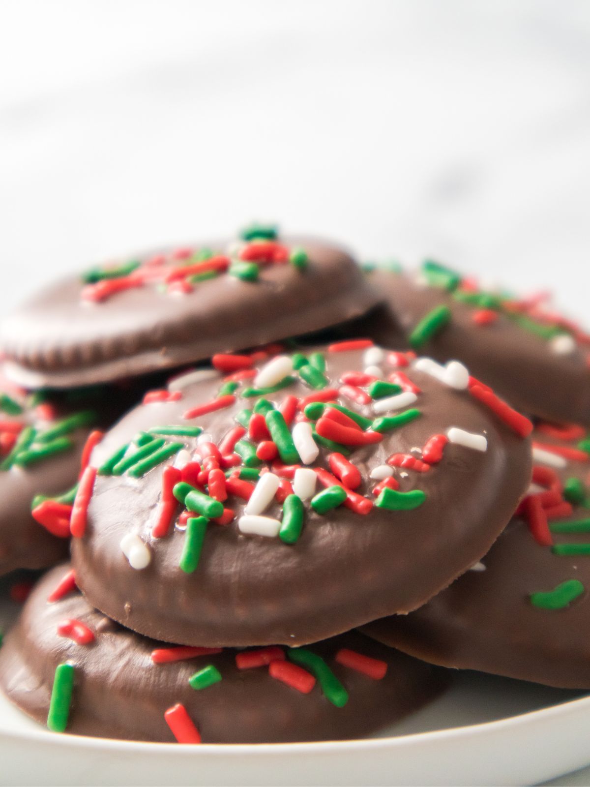 close up of chocolate dipped Christmas cookies.