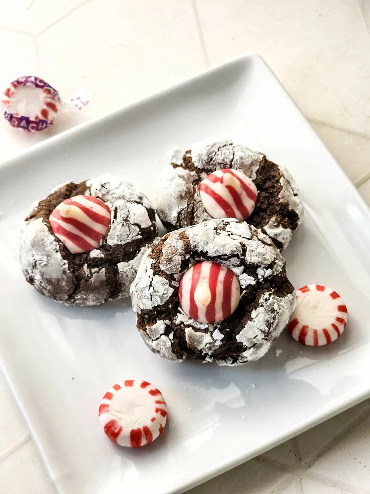 baked cookies on white plate for Christmas.