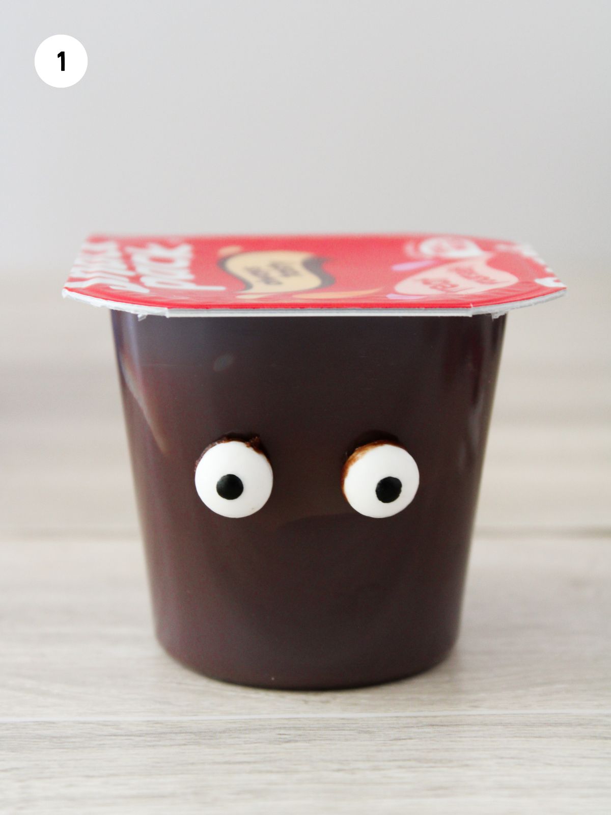 candy eyes added to pudding cup