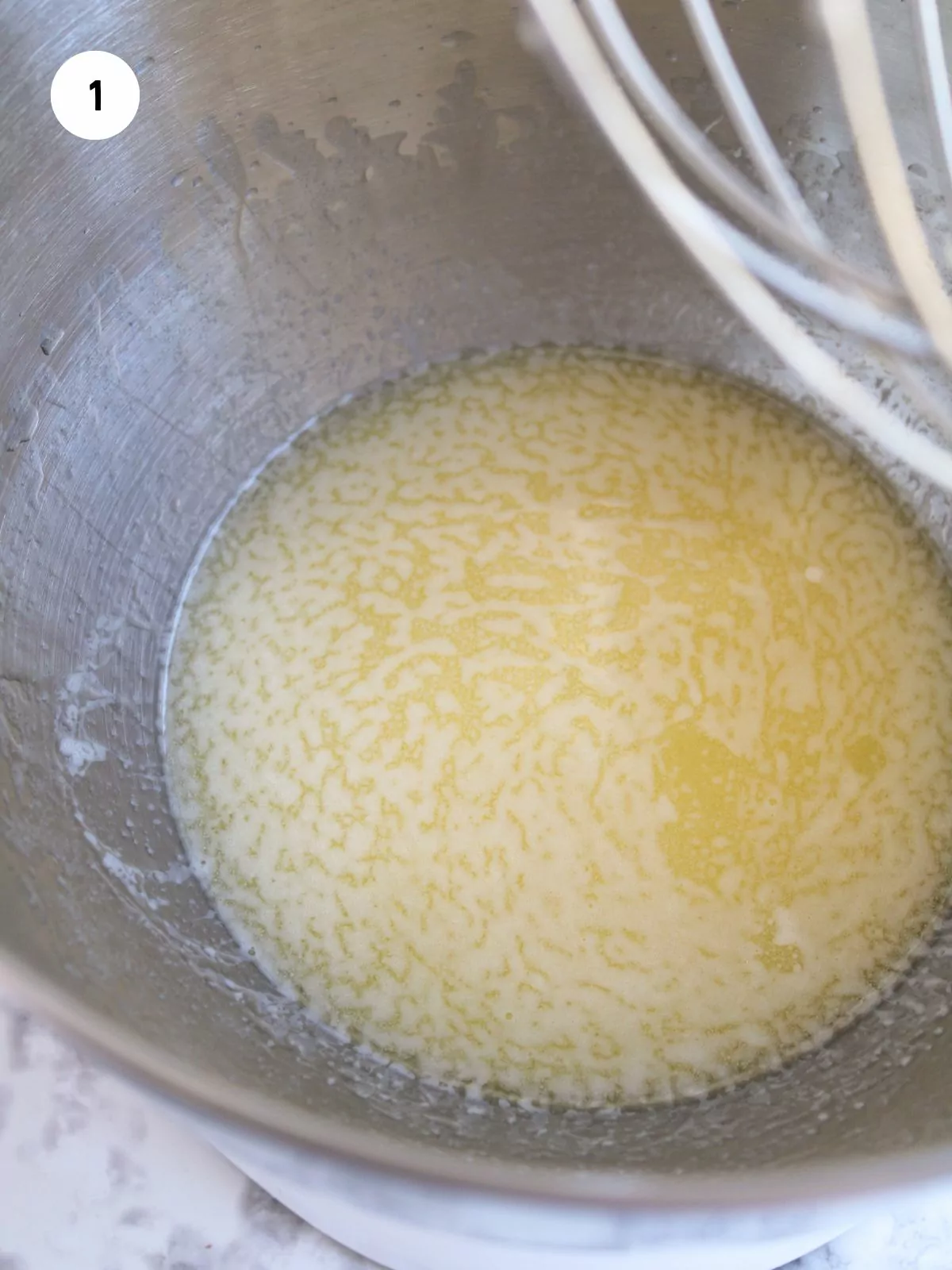 melted butter in mixer bowl