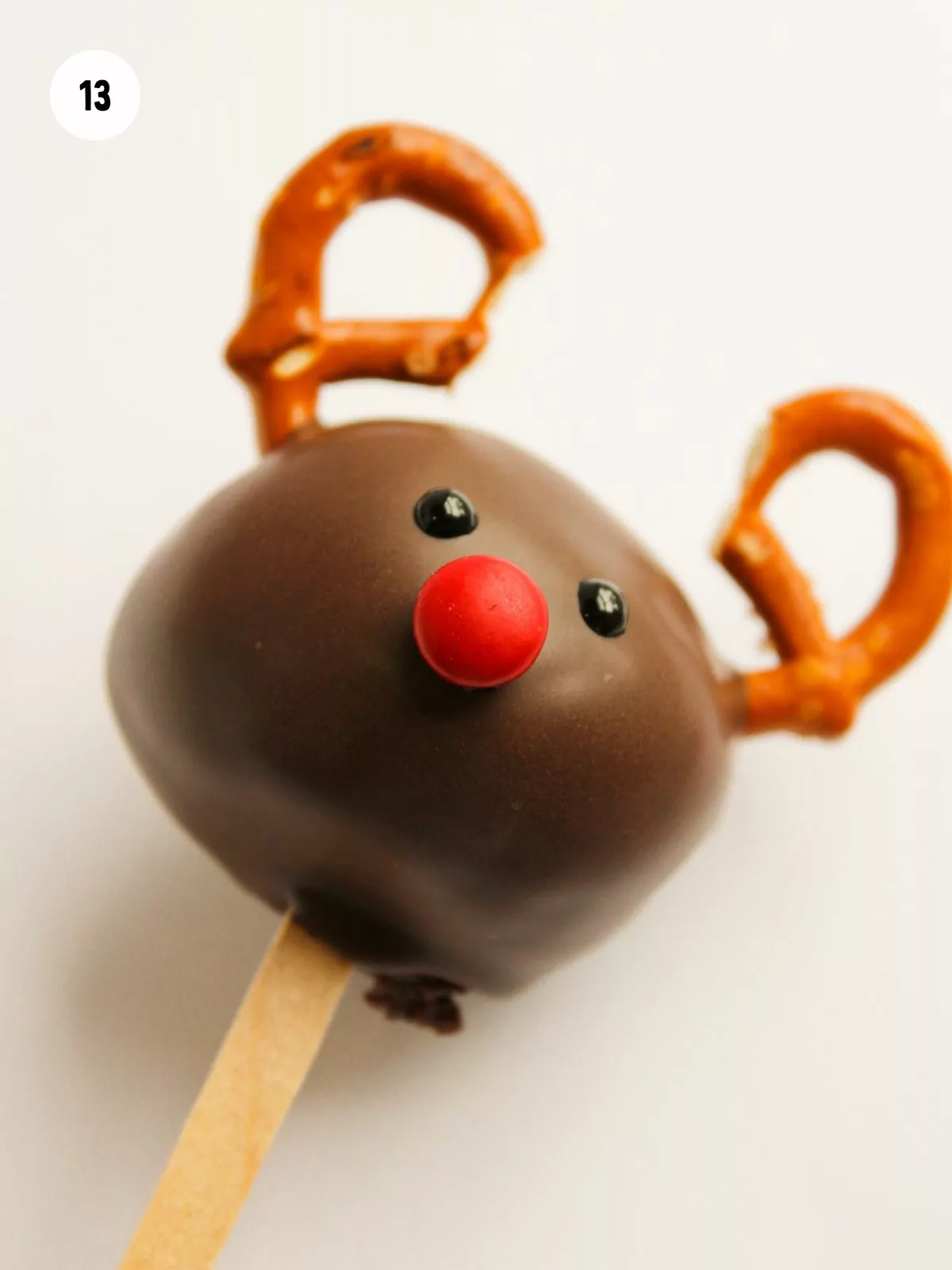 red m&m nose on a reindeer cake pop