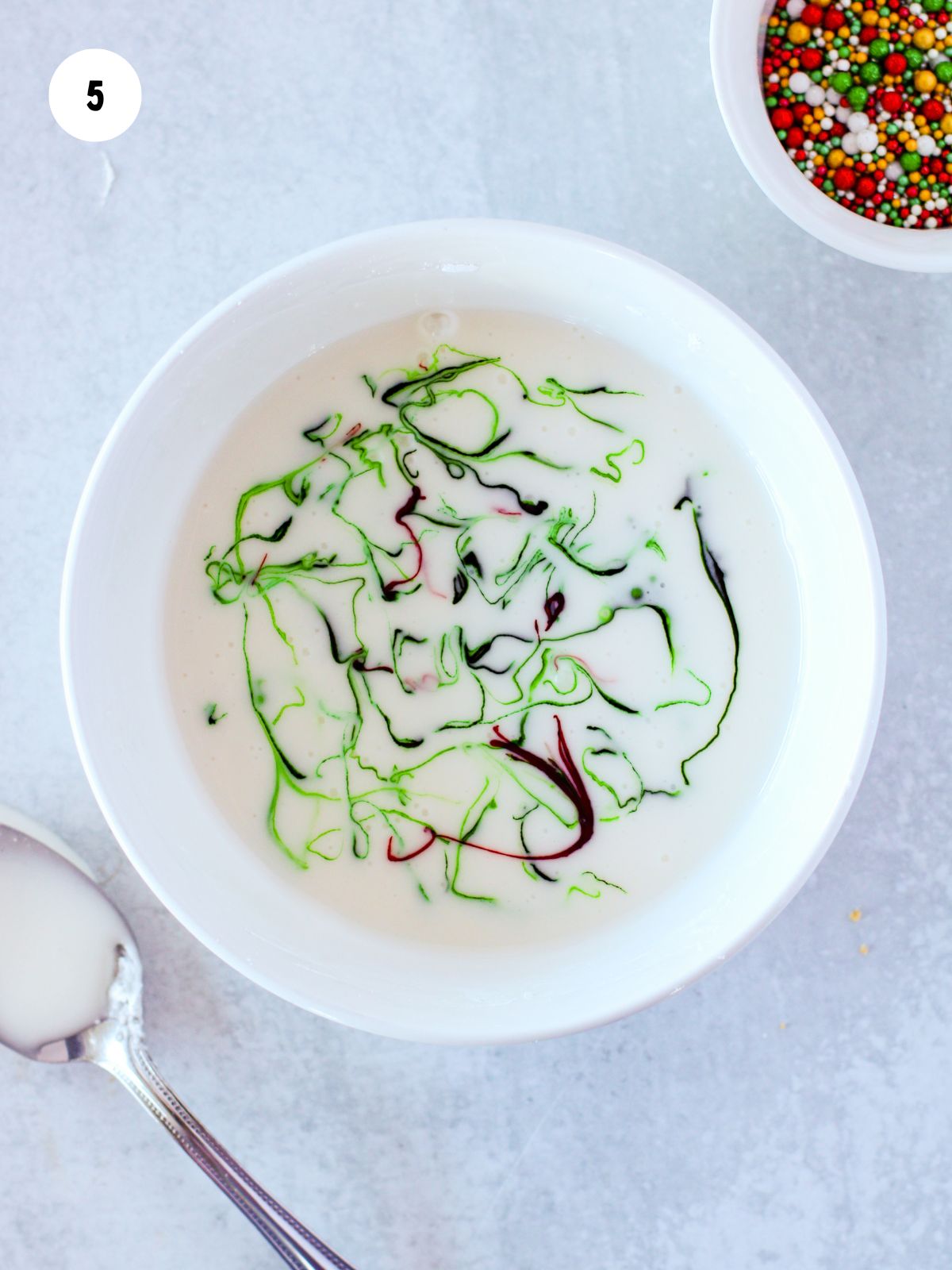 green food coloring swirled in icing