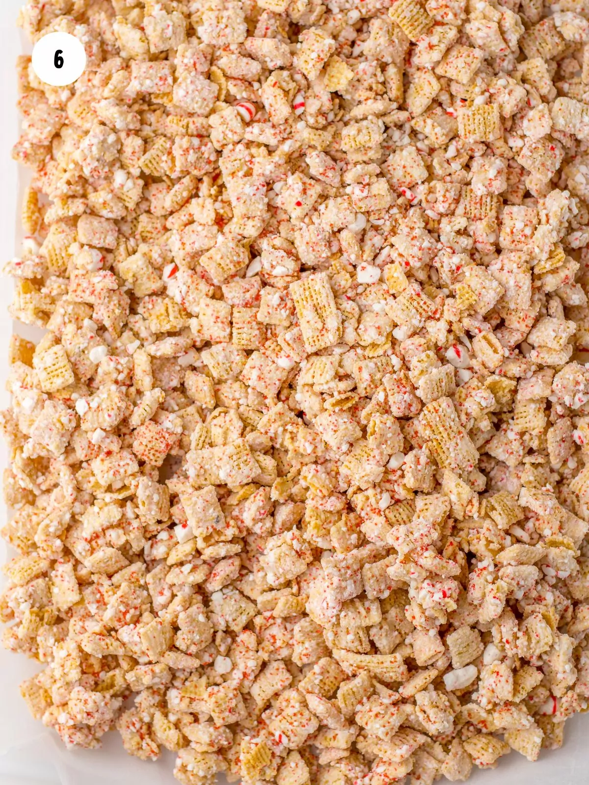 white chocolate chex laid out in a single layer