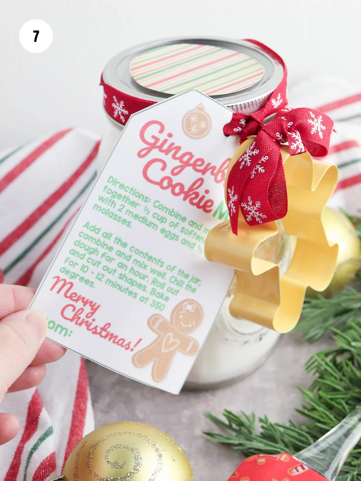 recipe tag and cookie cutter attached to the jar with ribbon