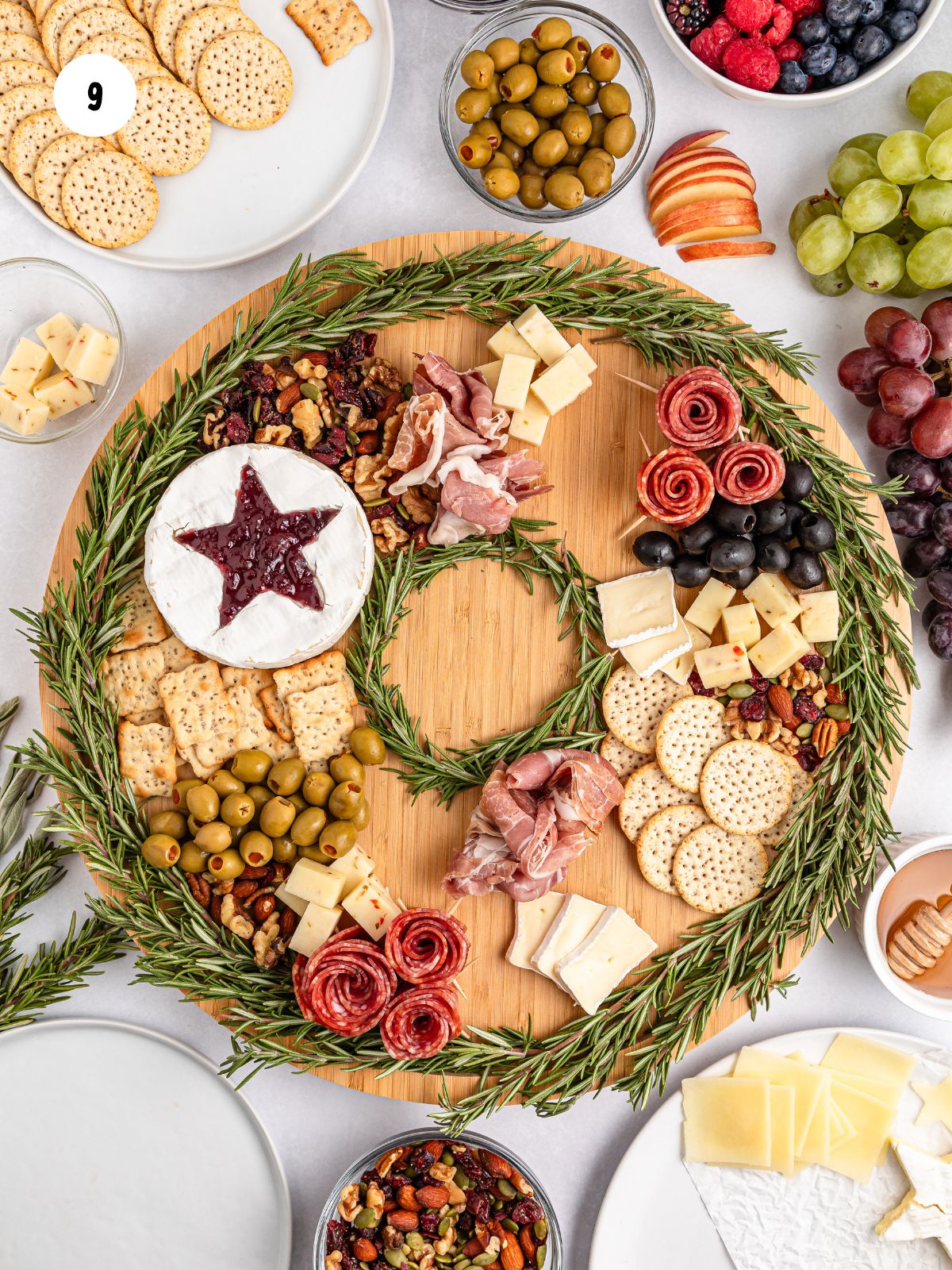 prosciutto and cheeses added to wreath