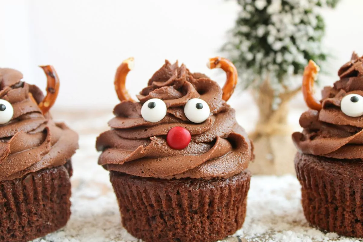 Chocolate cupcakes with chocolate frosting decorated like Rudolph