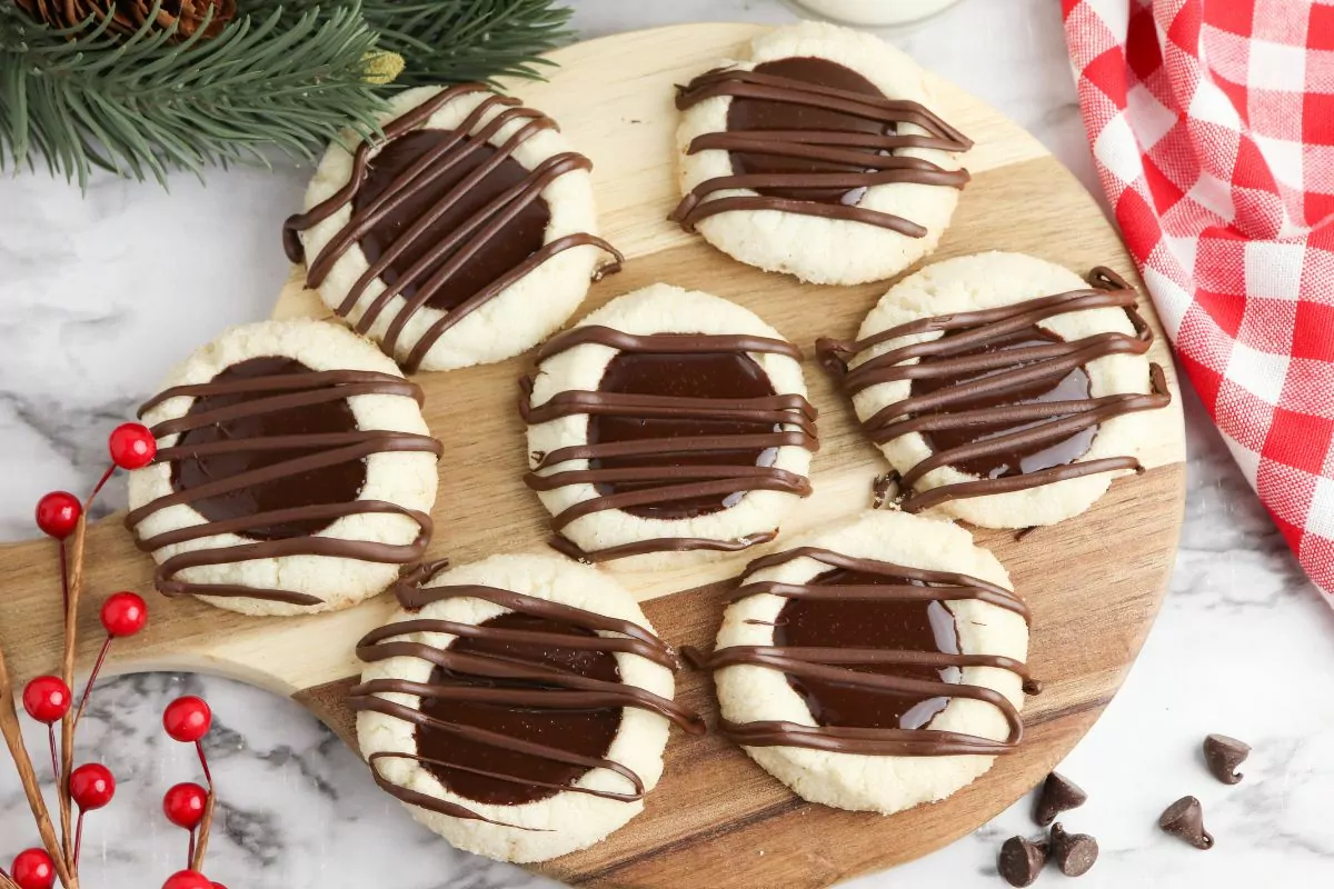 Chocolate thumbprint shortbread cookies on cutting board MSN.