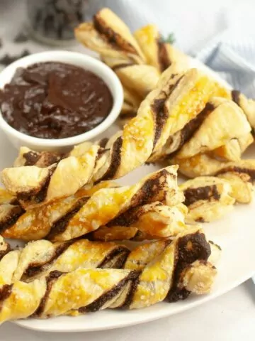 Air Fryer Puff Pastry Chocolate Twists with chocolate sauce dip