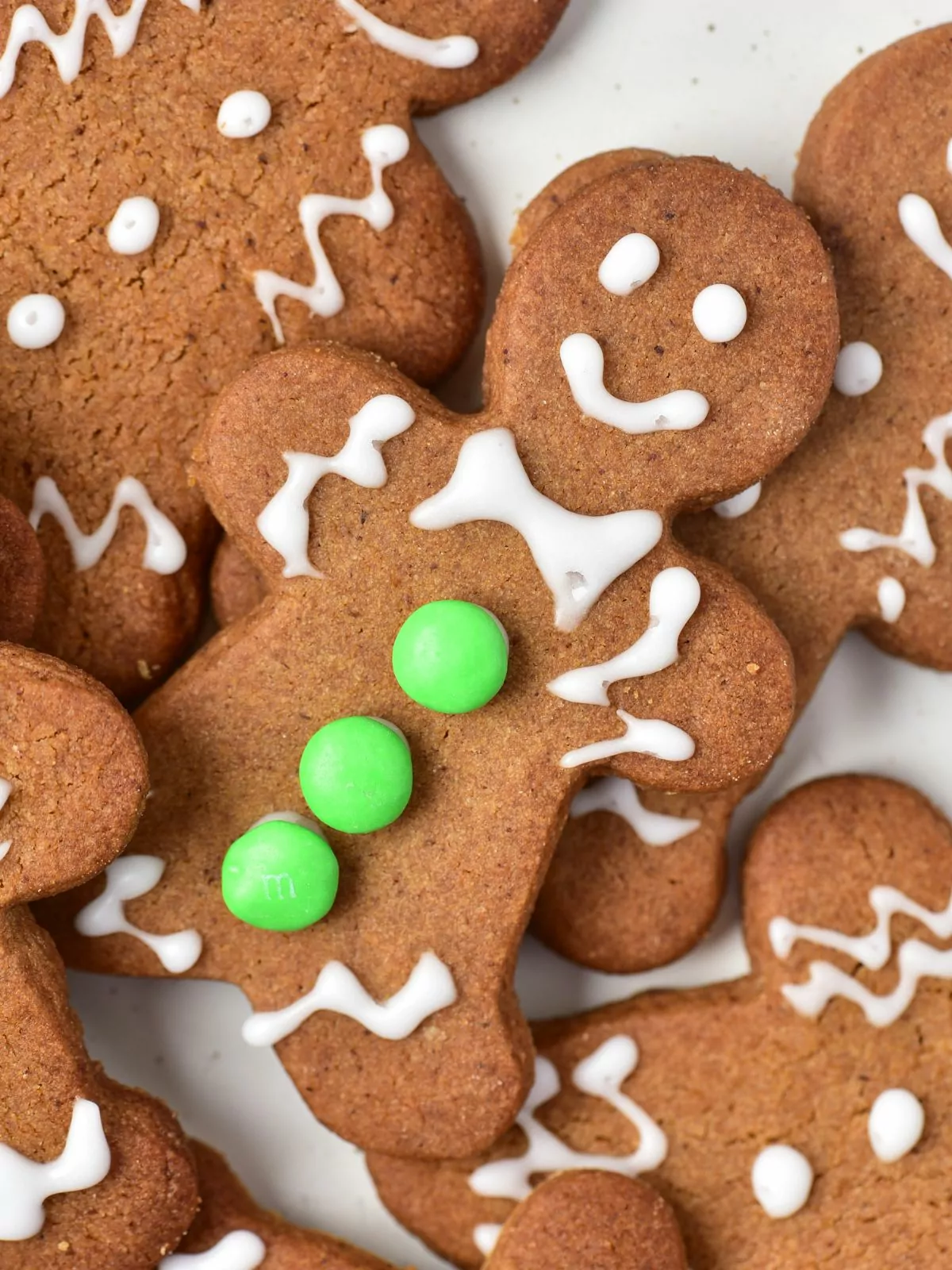 decorated gingerbread man cookie with green buttons