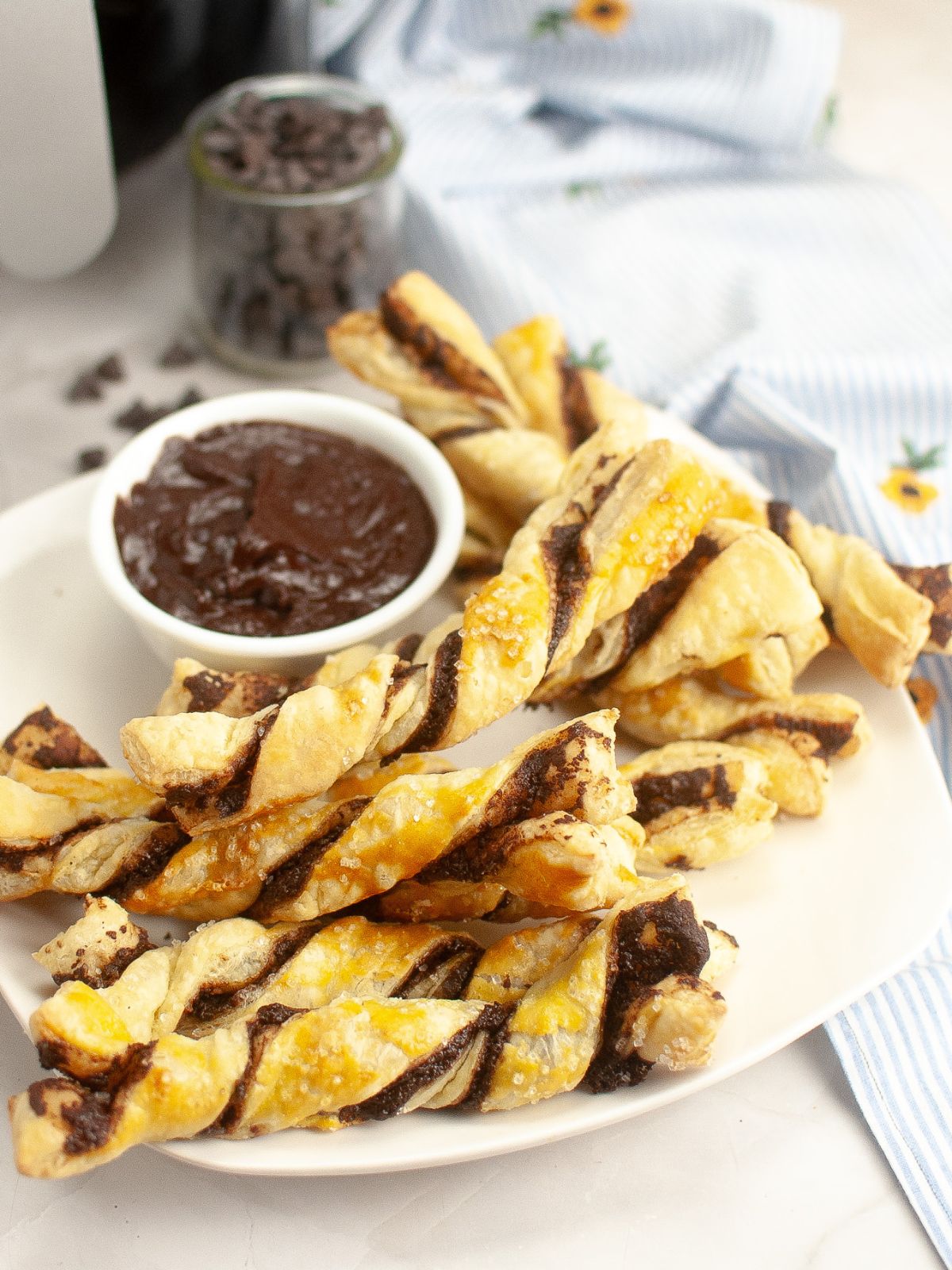 Air Fryer Puff Pastry Chocolate Twists with chocolate dipping sauce