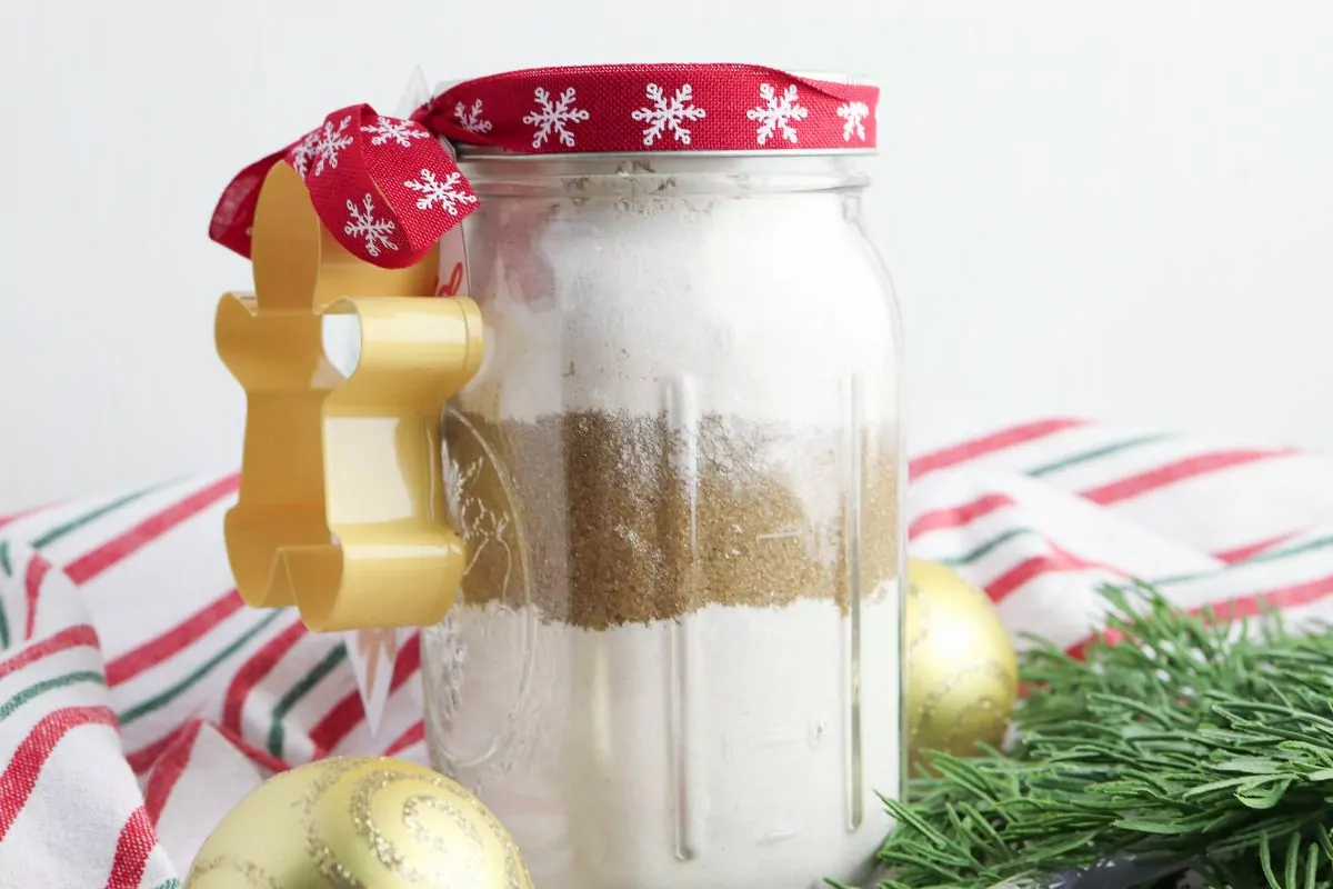 Gingerbread Cookie Mix in a Jar showing the layers of ingredients in the jar