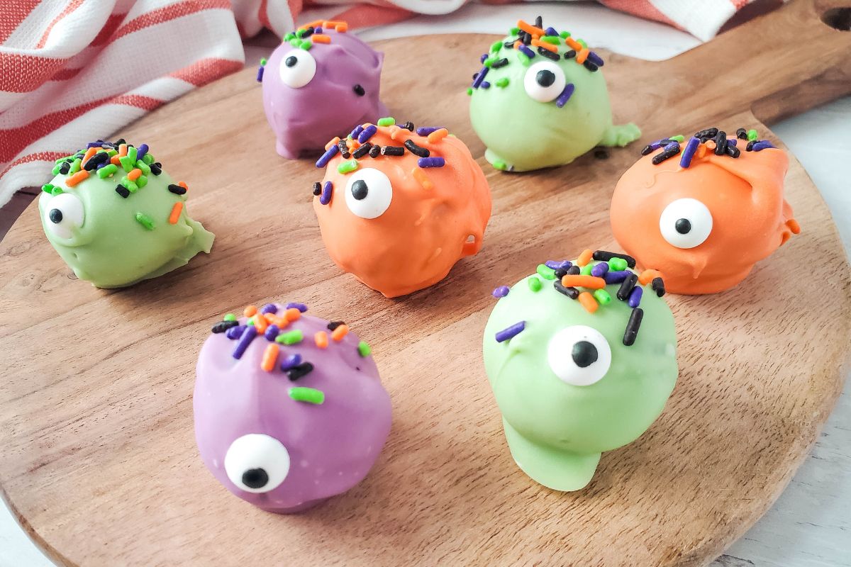 Halloween Oreo Ball Truffles decorated with melted candy,sprinkles and candy eyes. MSN.