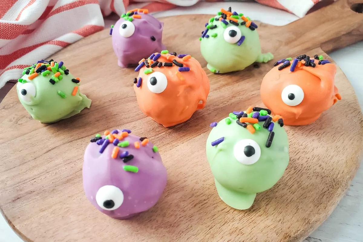 Halloween Oreo Ball Truffles decorated with melted candy,sprinkles and candy eyes. MSN.