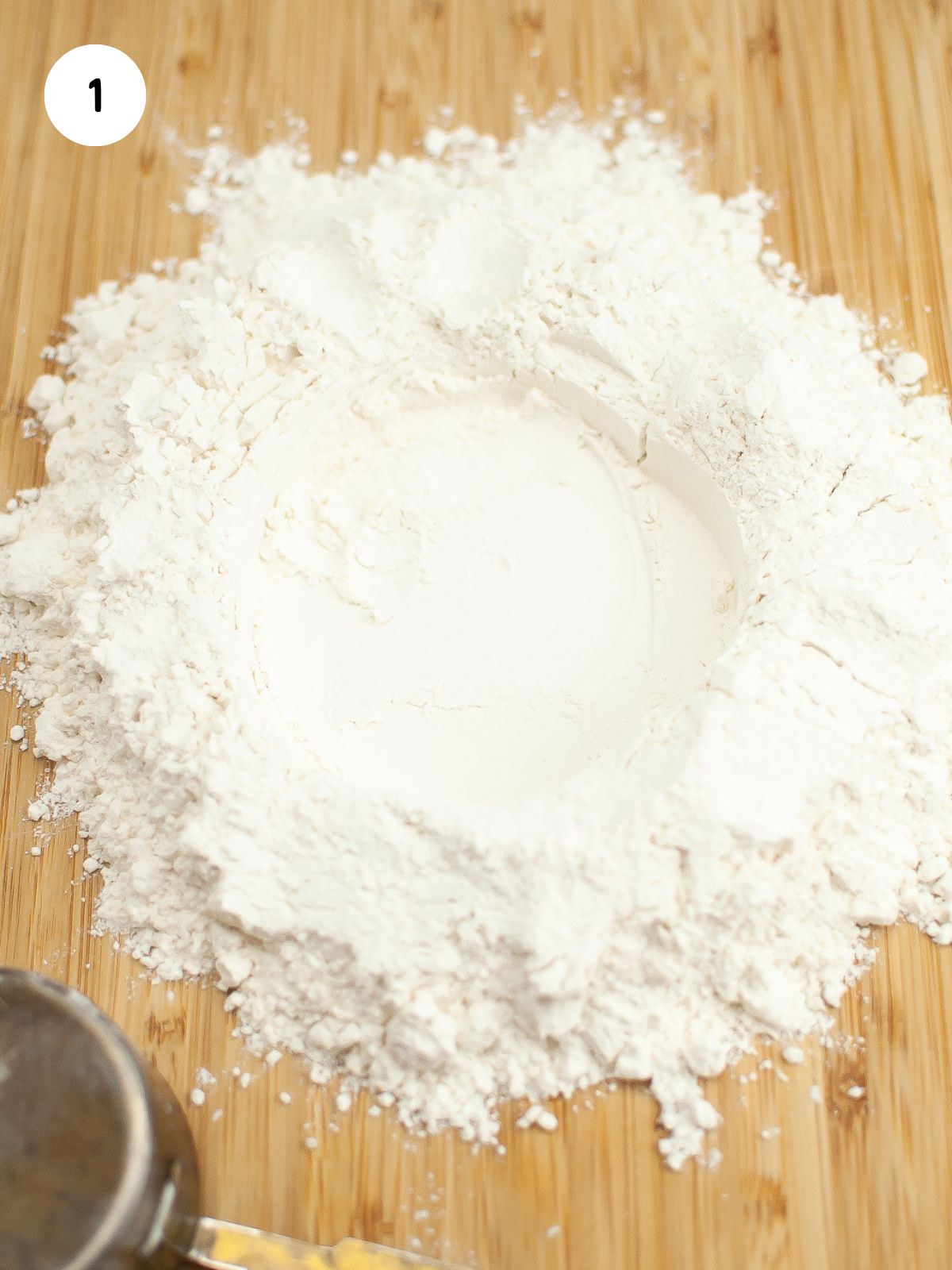 Create a well in the flour