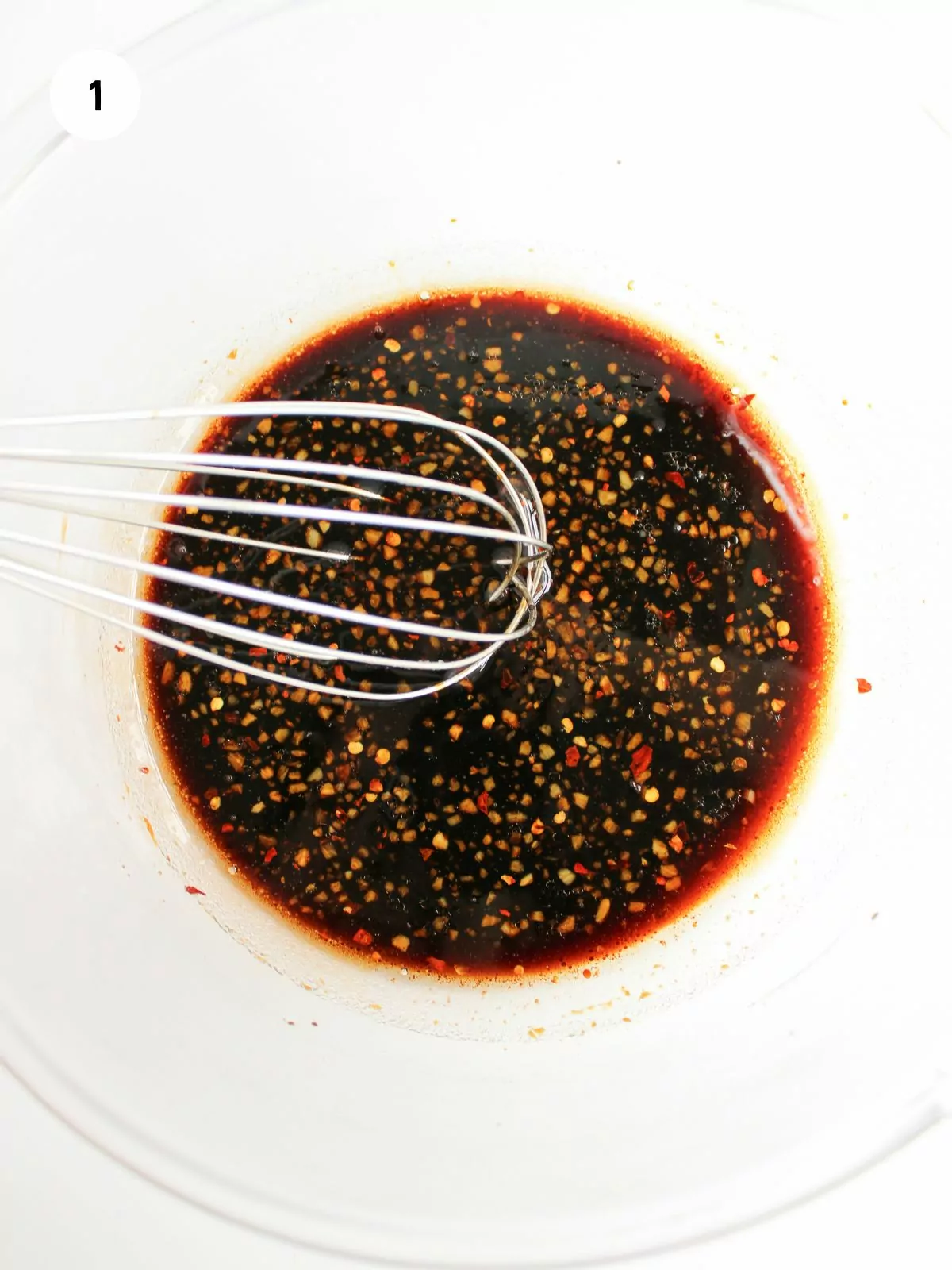 marinade and whisk in a clear mixing bowl