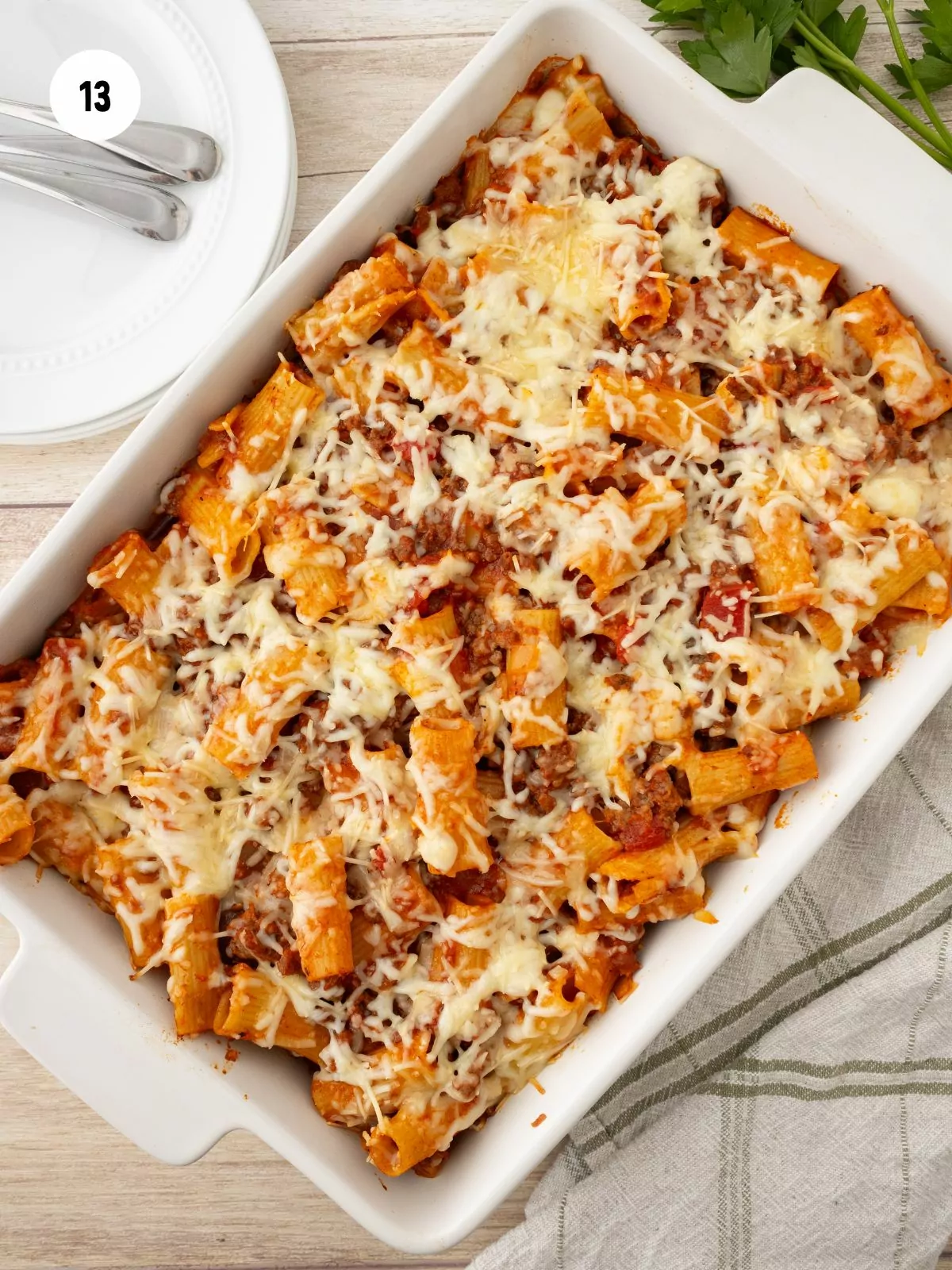 baked rigatoni in a white casserole dish