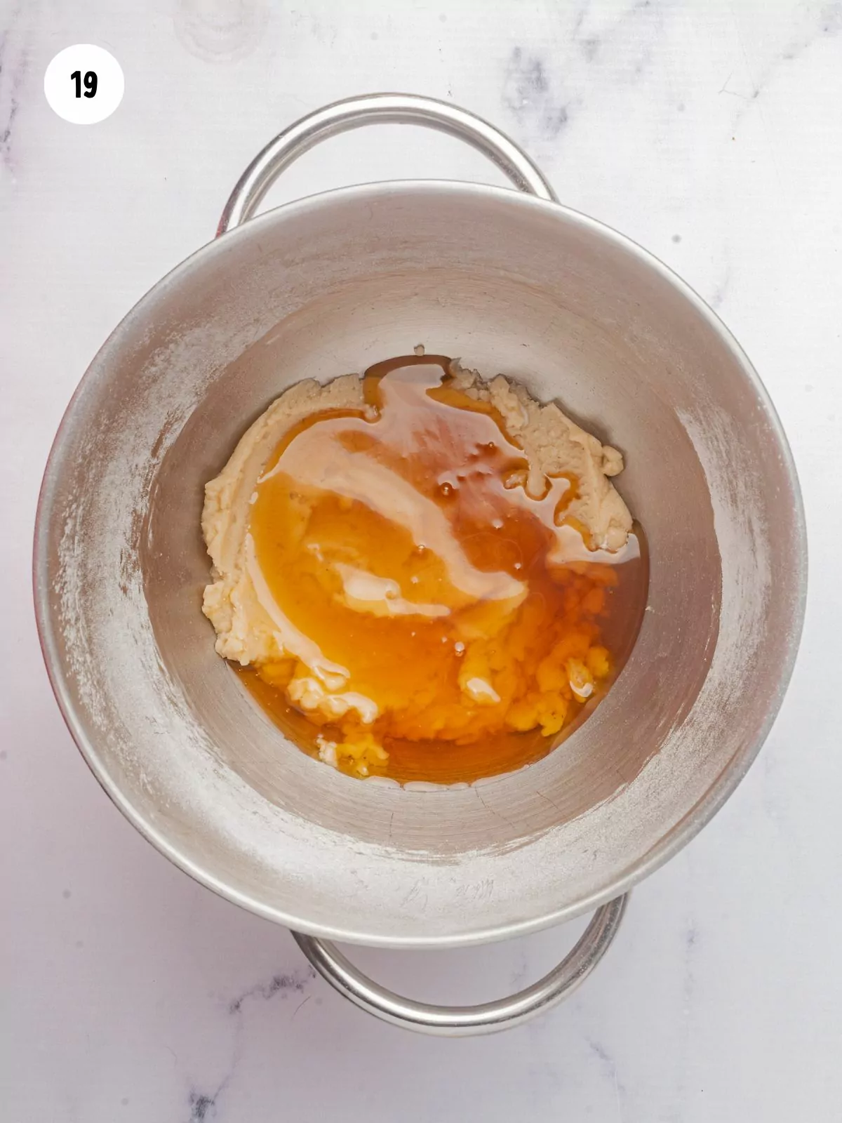 maple syrup added to butter and powdered sugar mixture