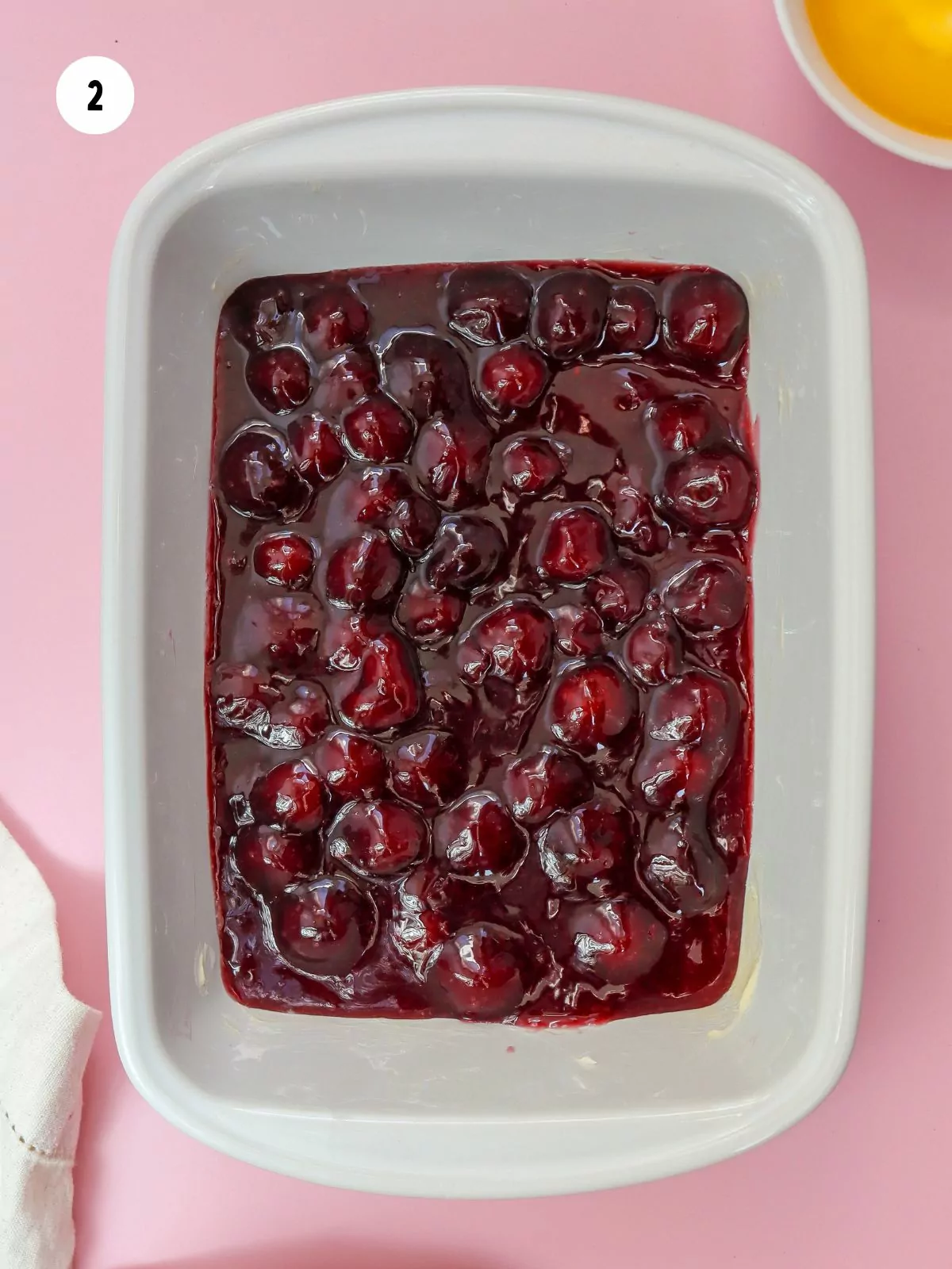 cherry pie filling in a baking dish