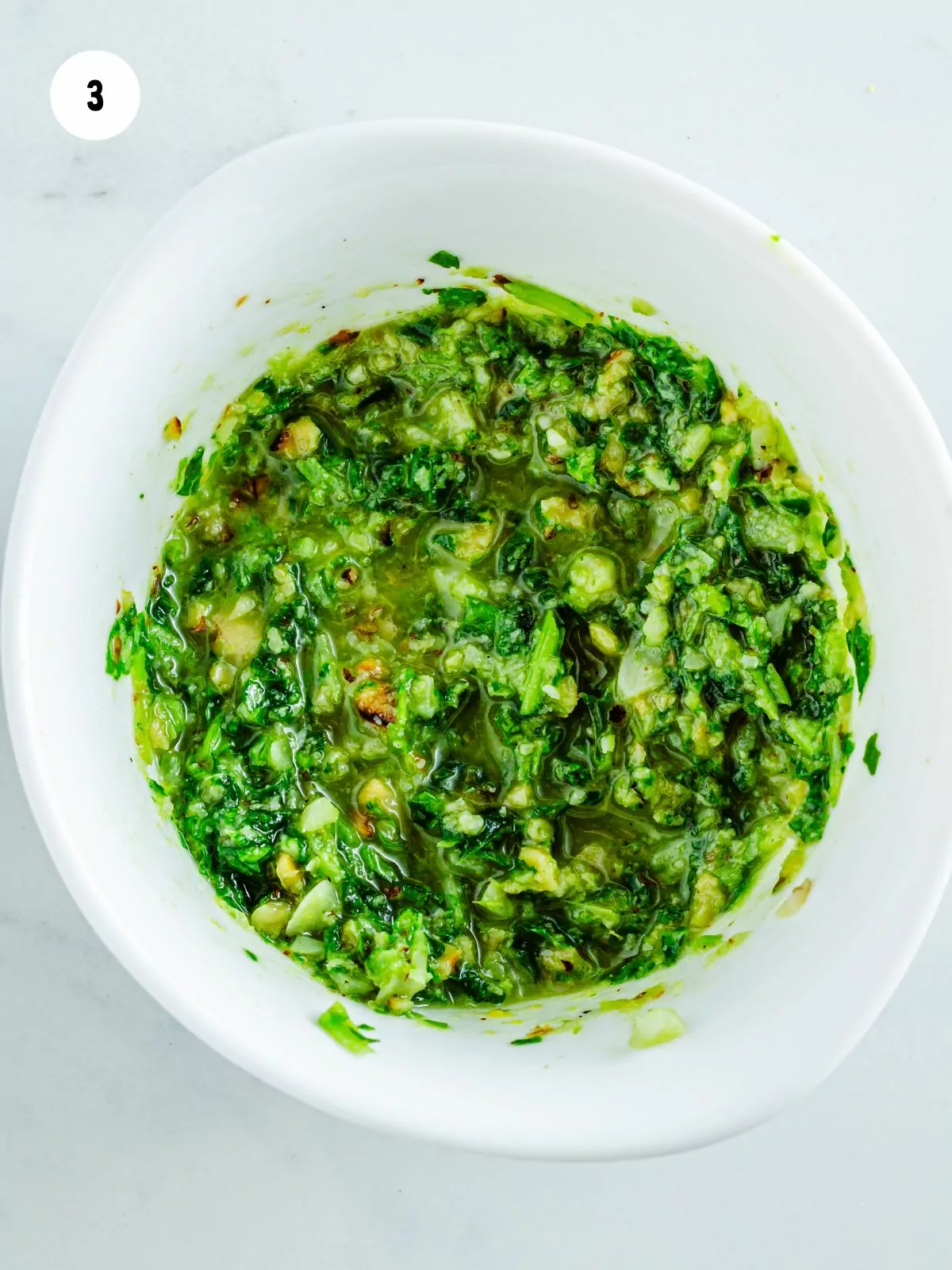 pesto ingredients transferred to bowl