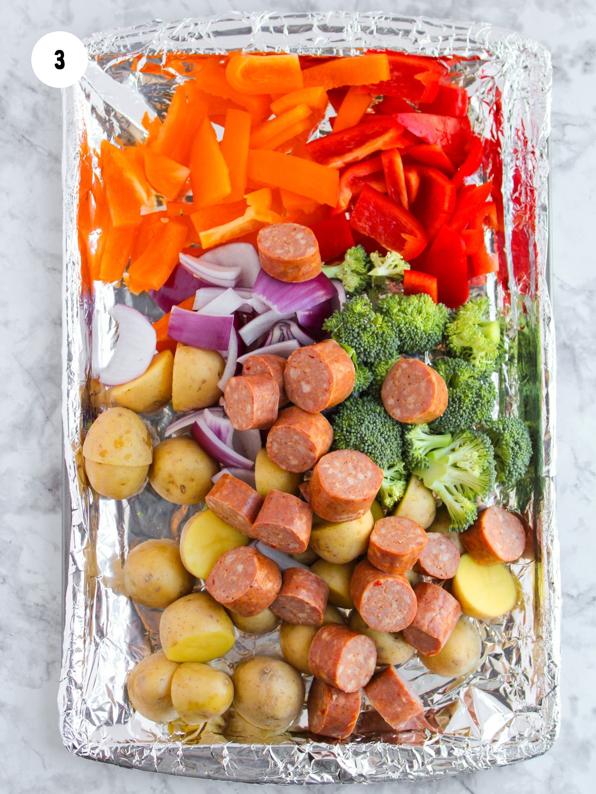 sausage and veggies on sheet pan