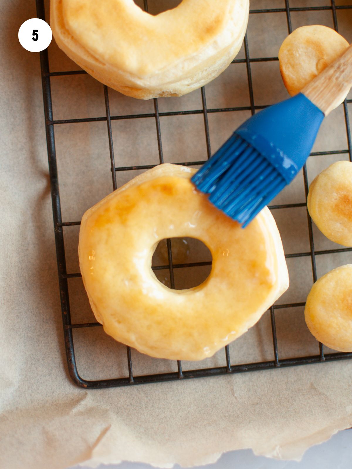 melted butter brushed on air fried donuts