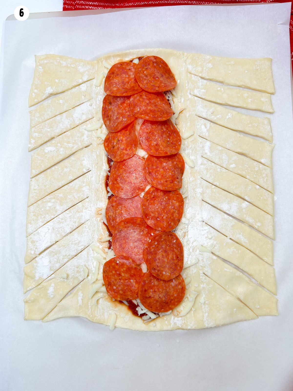 puff pastry on either side of the filling cut into diagonal slices