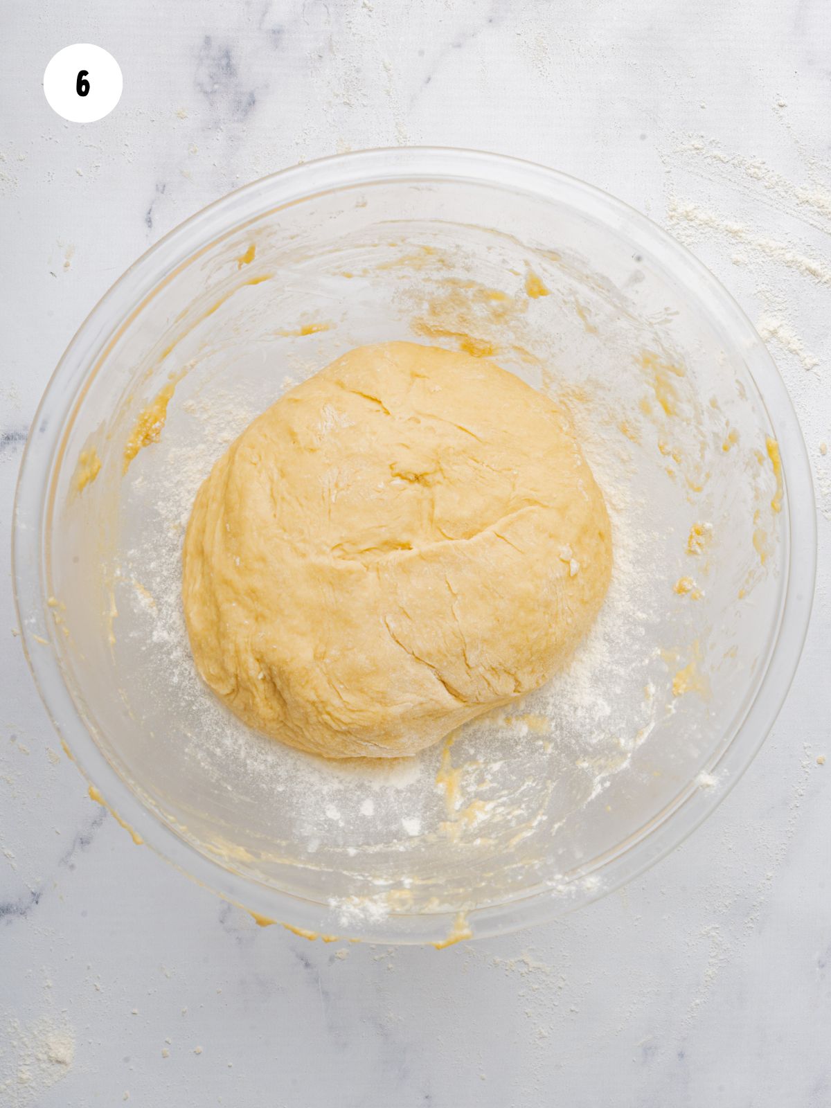 ball of smooth dough in mixing bowl